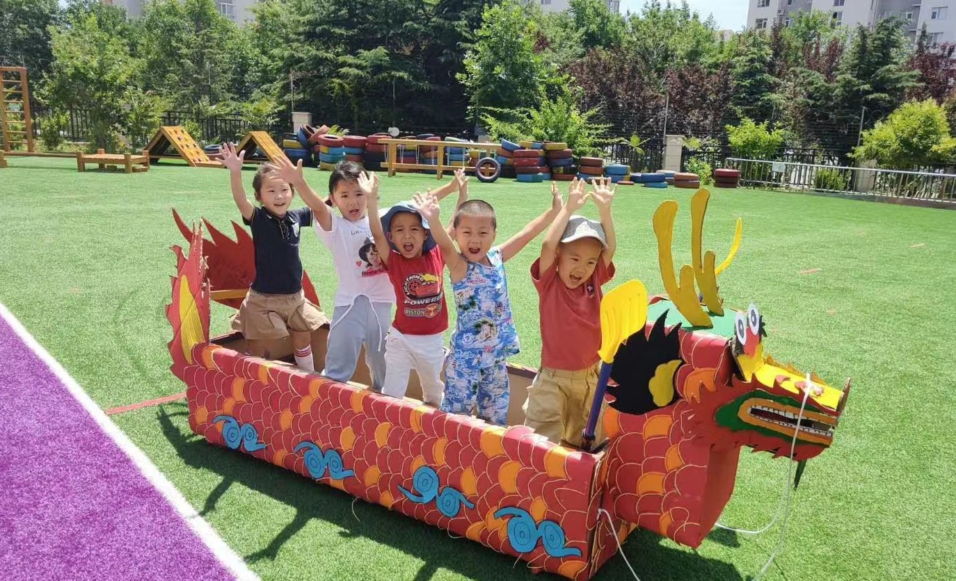 包粽子、赛龙舟、搓彩绳……智慧熊幼儿园端午节活动记